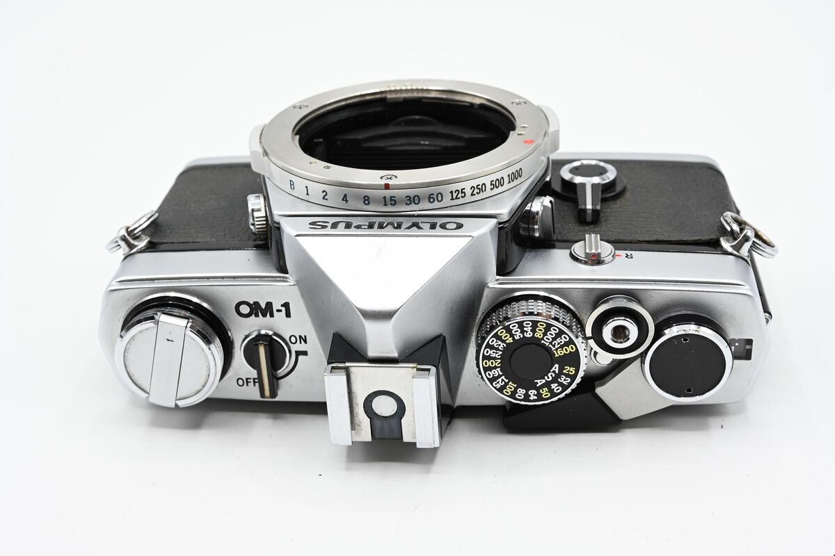 Olympus OM-1 OM-1n M-1 in Chrome or Black w/ optional 50mm f Olympus OM-1 OM-1n M-1 in Chrome or Black w/ optional 50mm f