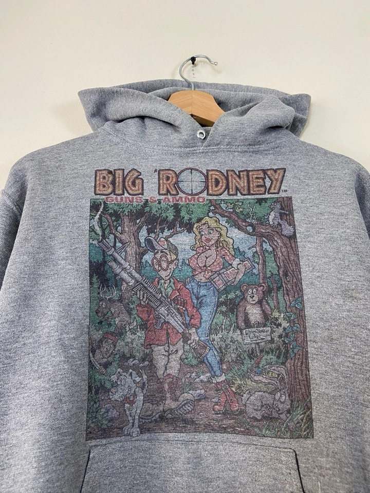 Sudadera con Capucha Gris Arte Cazador Bebé Safari Pistolas y Munición Big Rodney Divertida De Colección - S/M Foto 2 de 4