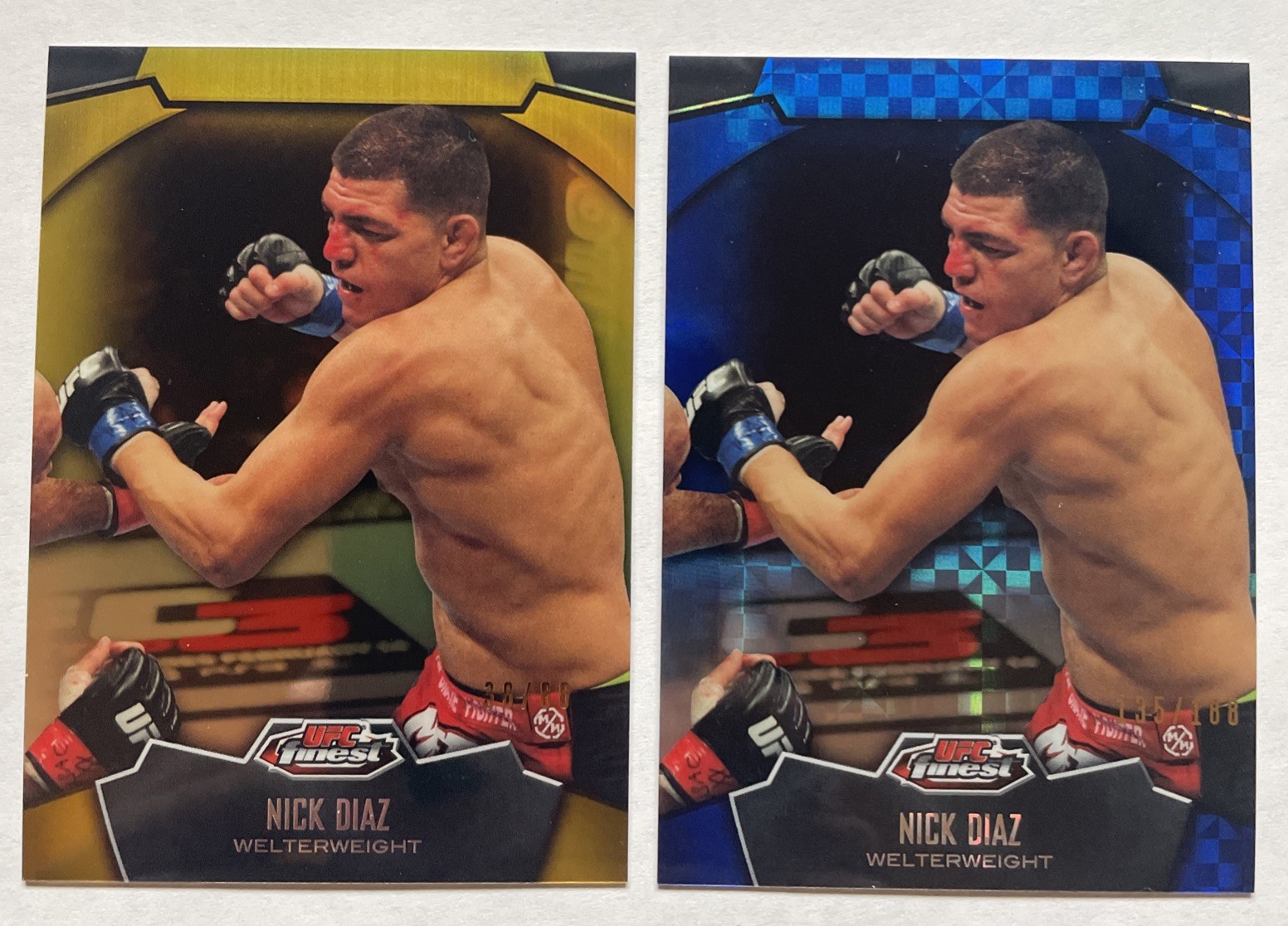 Nick Diaz 2012 Topps Finest Refractors 38/88 Gold, 135/188 Blue