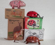 4x Blechspielzeug mit Federwerk und Schlüssel in OVP