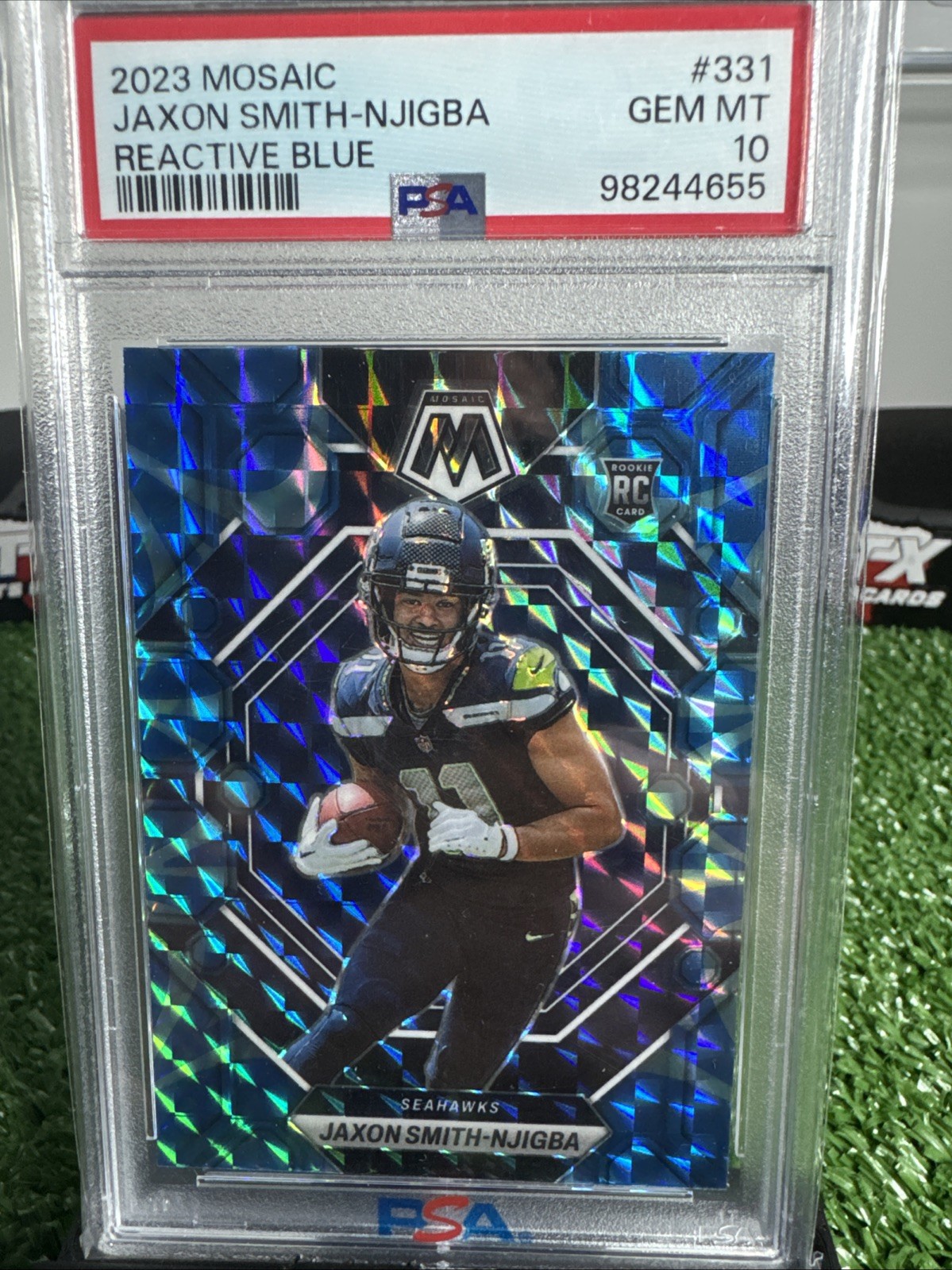 2023 Panini Mosaic - Rookies Jaxon Smith-Njigba #331 Reactive Blue Mosaic Prizm 