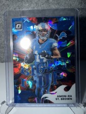 2025 Panini Donruss Optic Light It Up Amon-Ra St. Brown #15 Ice /55