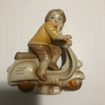 capodimonte figurine Boy on scooter vespa made in italy procelain