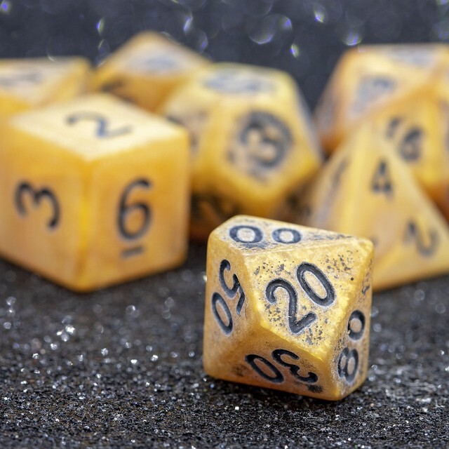 Sage's Ancient Golden Stone Black Ink Acrylic Polyhedral Dice Set