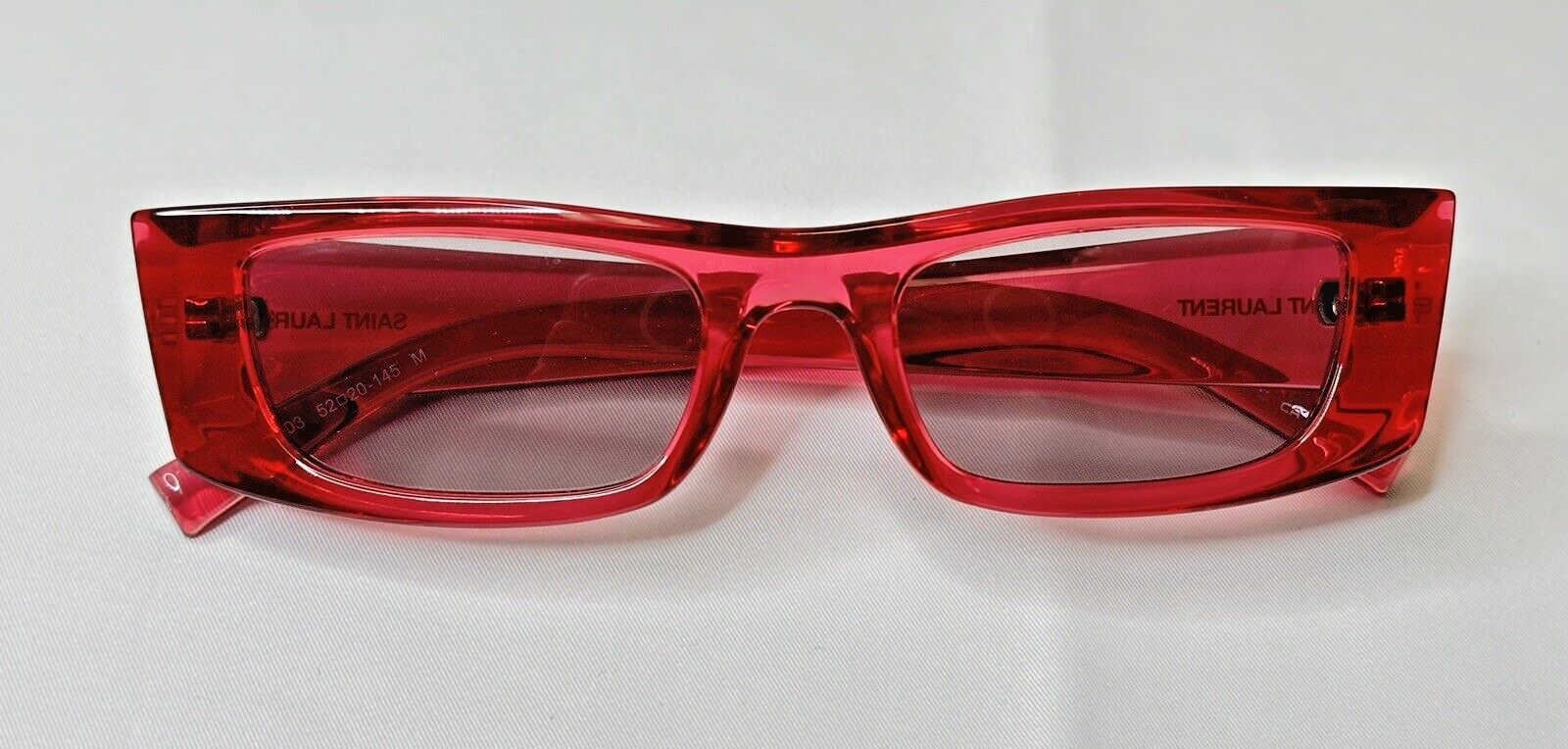 Occhiali da sole unisex Saint Laurent SL 553 003 rosa viola stretti con custodia originale