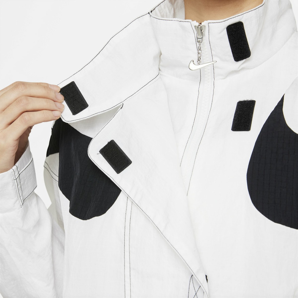 nike swoosh repel