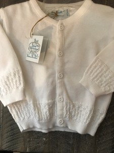 newborn white sweater