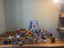 Skylanders Lot 34 Pieces 28 Figures 5 Magic Items 1 Water Trap  Book