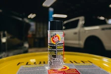 Fluid film black aerosol