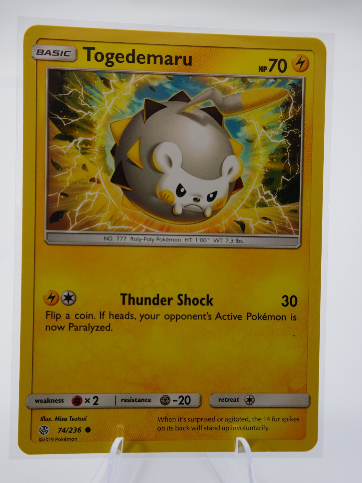 Togedemaru 74/236 PL / LP  Cosmic Eclipse Pokemon Card - Misa Tsutsui Art