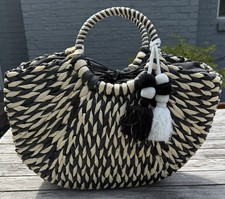 Woven Two-Tone Black Tan Straw Tote Bag Circular Handles Drawstring Lining