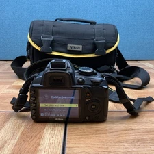 Nikon D3100 14.2MP Digital SLR Camera Black Body Only + carrying case