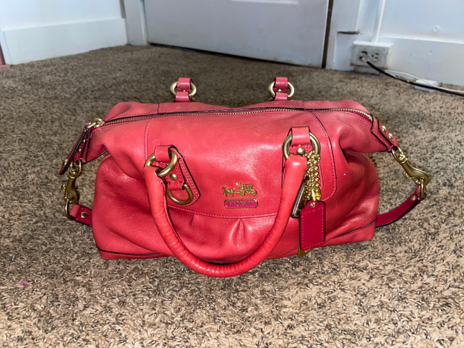 Coral leather coach handbags for women stylish and elegant-image