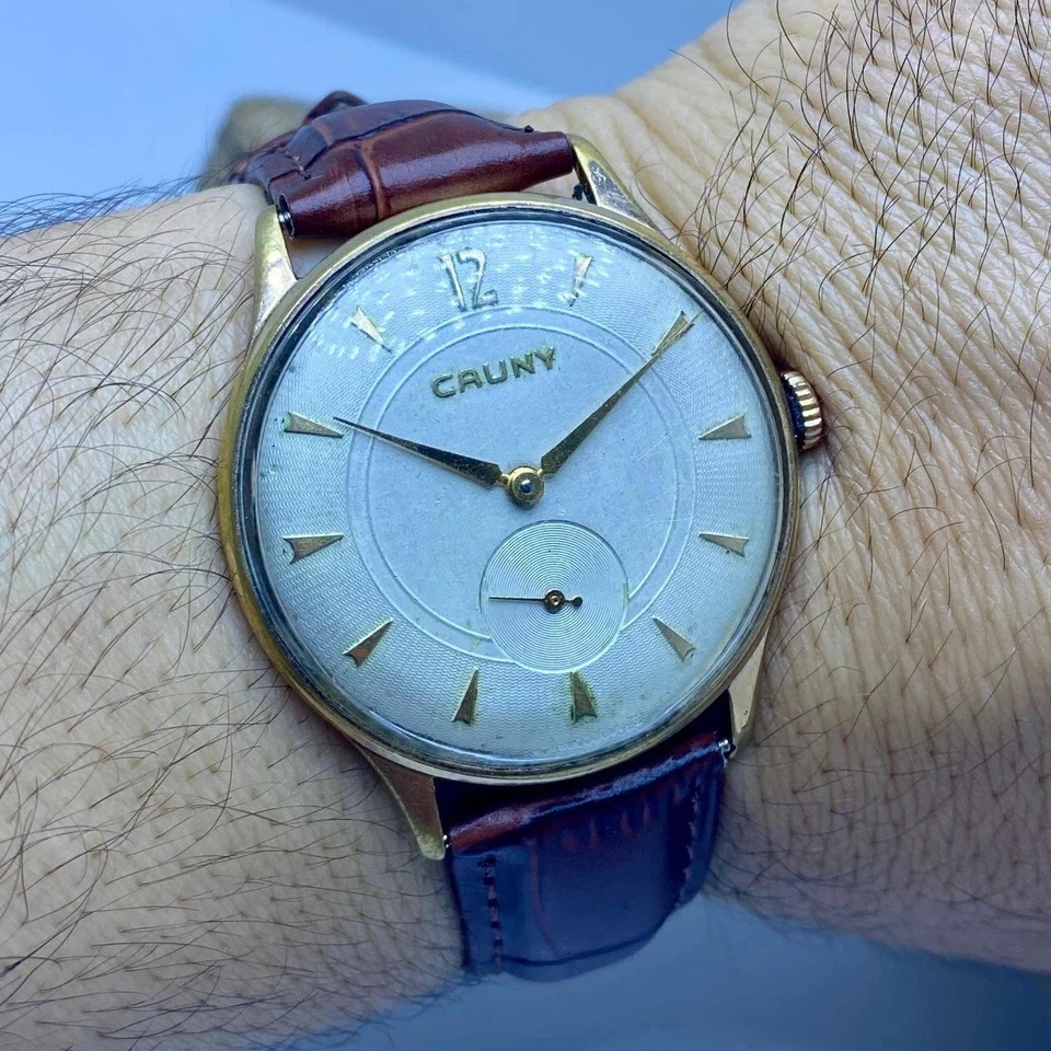 Reloj vintage años 50 CAUNY XL Jumbo para hombre cuerda manual enchapado en oro suizo nuevo de stock Foto 2 de 4