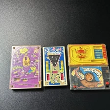 TOMY pocket games - vintage lot of 4 games - used - Archie Pinball Moto Cross