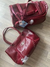 Kathy Van Zeeland Rolling Duffle And Bag Set