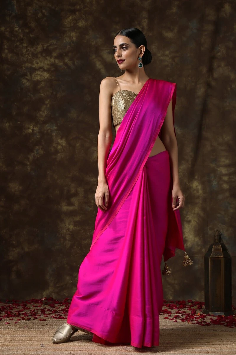 red plain saree with golden blouse