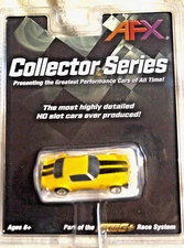 COLLECTOR SERIE  CAMARO  AFX MEGA G PLUS YELLOW & BLACK  CAR AND SHELL ARE MINT