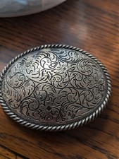 womens silver belt buckle.