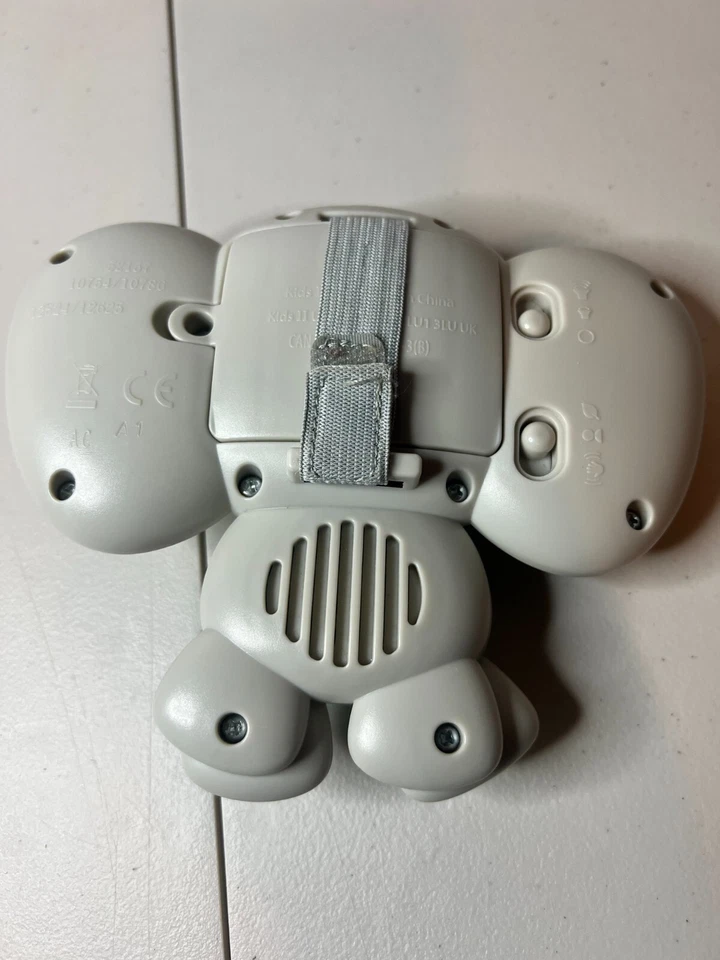 Kids II Inc. Ilumina y reproduce una variedad de sonidos juguete elefante para niños gris Foto 4 de 4