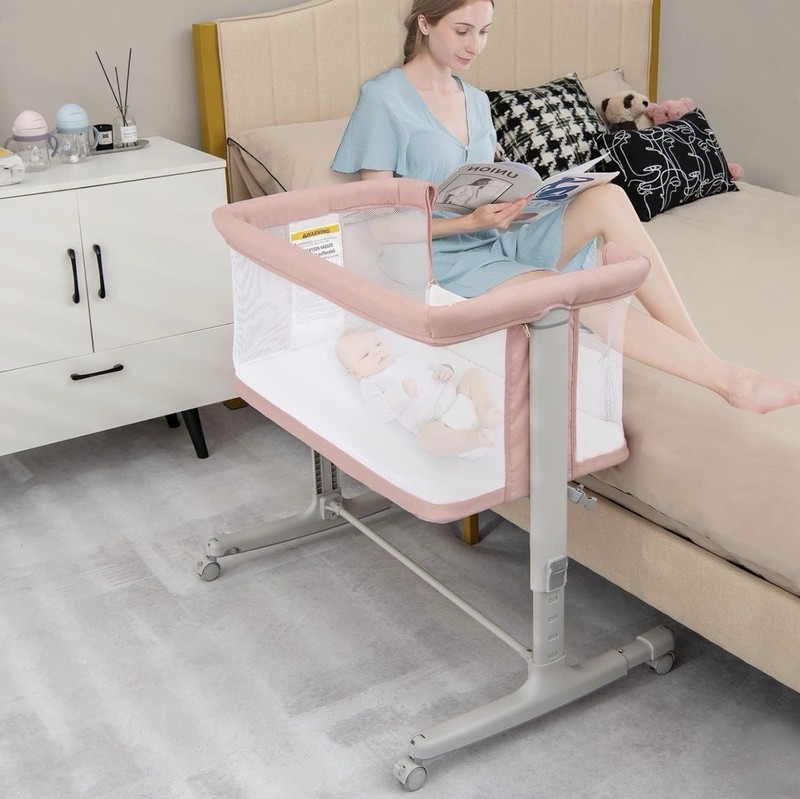 Infans Pink Convertible Bedside Sleeper, Adjustable Height, Mesh Sides, Portable