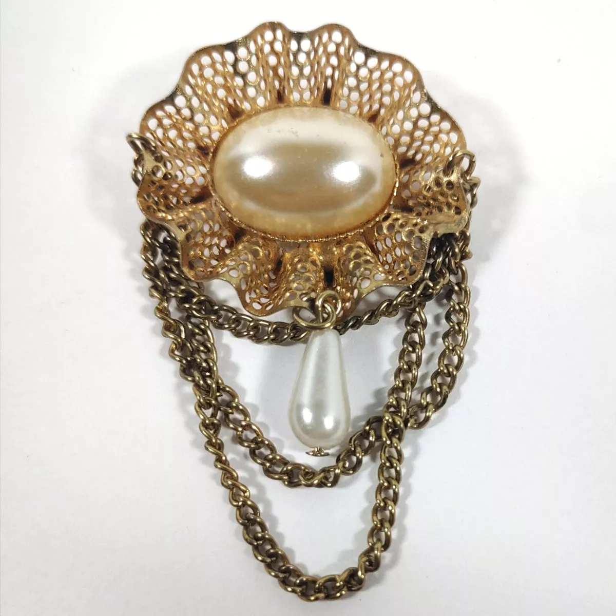 Hanging brooch sale