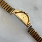 Vintage rare Seiko Rivoli Quartz Gold Tone Half Moon Asymmetric Watch