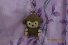 handmade crochet keychain, metal clasp. Fun baby monkey keychain/bagcharm