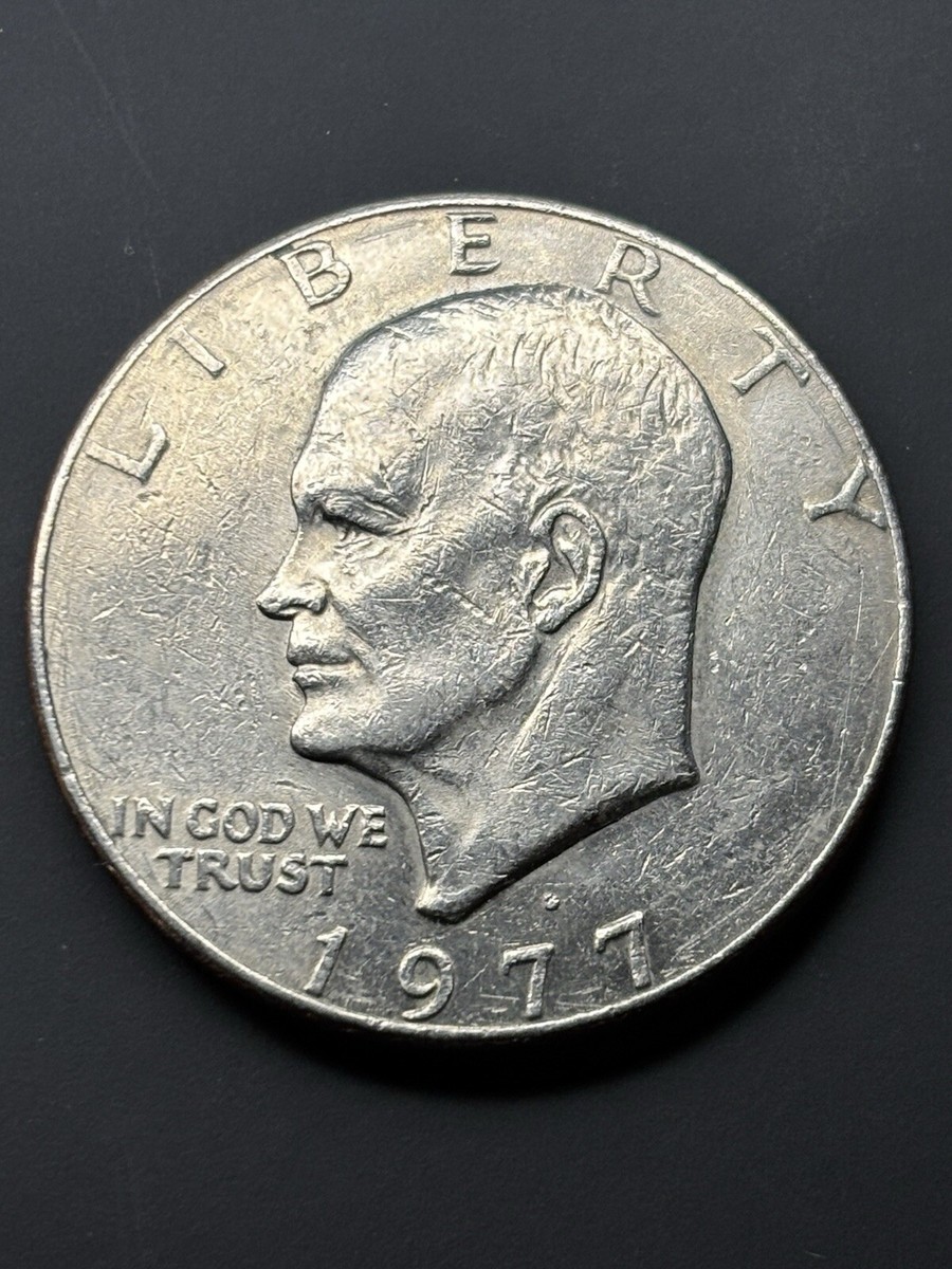 1977-D EISENHOWER $1 DOLLAR COIN ERROR: FILLED MINT MARK/DIE CHIP