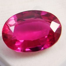 IGL Certified GUINEA Ruby 43.50 Ct. Natural Untreated Oval Intense Pink