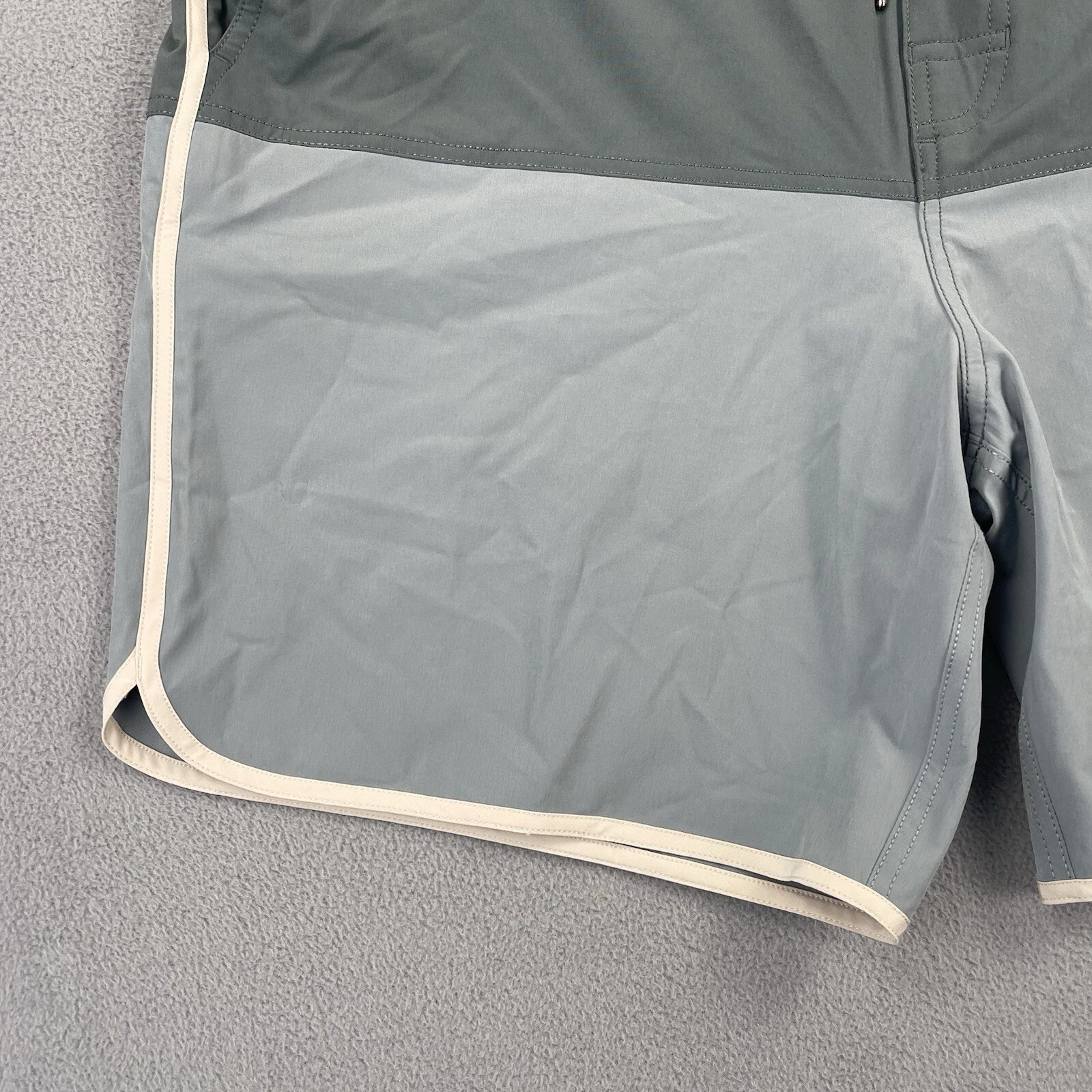 vuori swim trunks beach surf athletic stretch pockets shorts