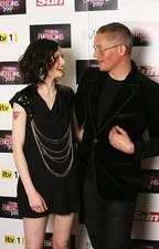 Singer Sophie Ellis Bexter designer Giles Deacon pose backstage af- Old Photo