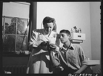 #ad Washington D.C. The school nurse removing a bandage from the finger of a $12.99