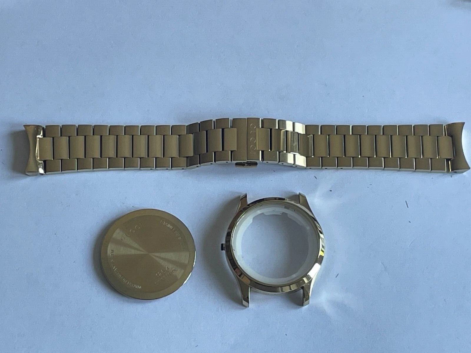 (LOT A589) Bracelet et boîtier de montre GUCCI plaqué or neuf, réf 126,4
