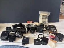 Canon AE-1 35mm SLR Film Camera with Accessories, Cases, Lenses, Manuals READ