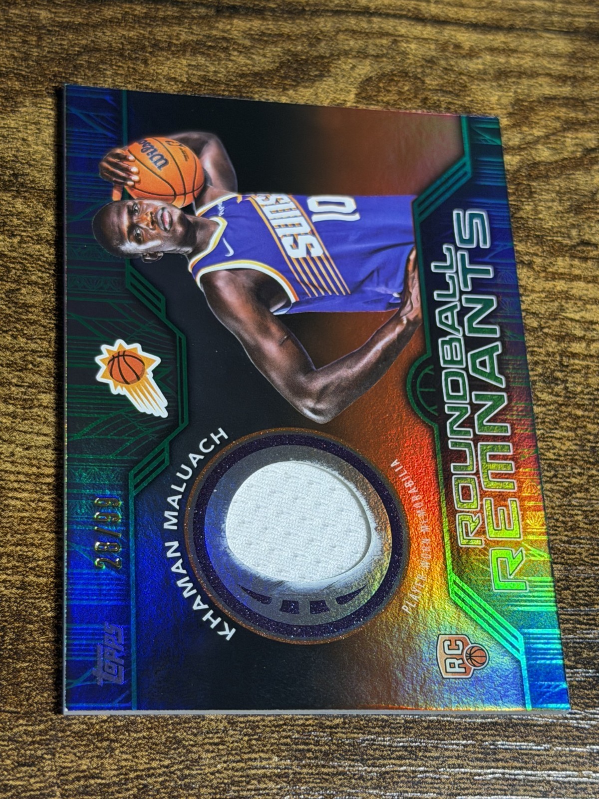 KHAMAN MALUACH 2025-26 Topps #RRR-KM Roundball Remnants Patch Green /99