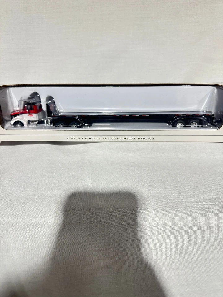 Peterbilt Logo 385 Semi w/ Flatbed Trailer By SpecCast 1/64th Scale - Image 2 of 4