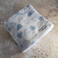 BLANKETS AND BEYOND WHITE WITH BLUE ELEPHANT PRINT BABY BLANKET