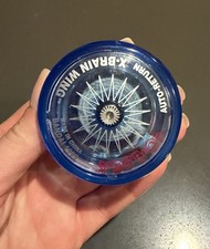 Yomega X-Brain Wing yo-yo, specifically a vintage blue model from 1999