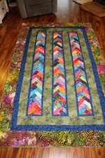 Twin size handmade quilt 98" X 62" in bright batik fabrics - blue green