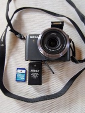 Nikon 1 S1 Digital Camera Black With Lens Working But With Issue Read Descriptio