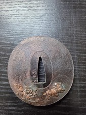 Garde de sabre ronde (tsuba) métal marron décor floral et