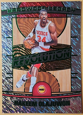 2024-25 Panini Revolution Hakeem Olajuwon #19 Hardwood Legacy Green Storm SN /99