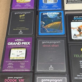 Atari 2600 System Bundle with Console, 37 Games, Joystick, Manuals, and More LOT