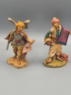 Set Of 2 Fontanini Depose Italy Figures. Gabriel Archangel 1997/Rug Dealer 1998