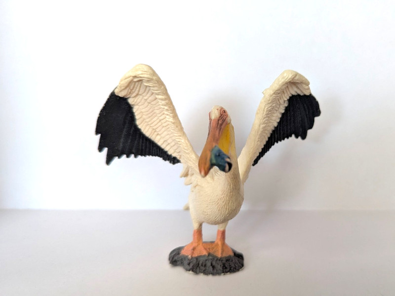 Retired Schleich White Pelican Figurine Holding a Fish, Vintage 2011 Collectible