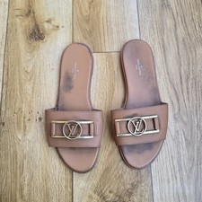LOUIS VUITTON LOCK IT FLAT MULES SLIDES SANDALS SIZE 38 EU, 7.5 US, 5 UK