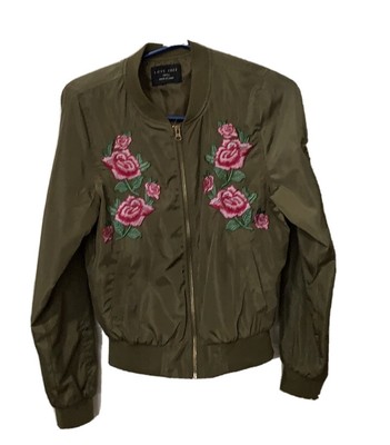 green jacket with flowers