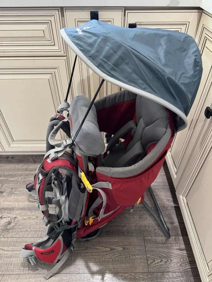 Mochila de senderismo Deuter Kid Comfort 2 portabebés retráctil capucha para sol H2O roja Foto 2 de 4
