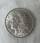 1884 O Morgan Silver Dollar AU
